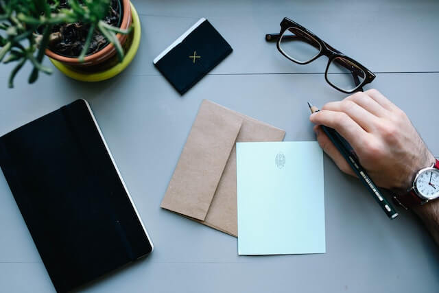 letter and envelope sitting on desk